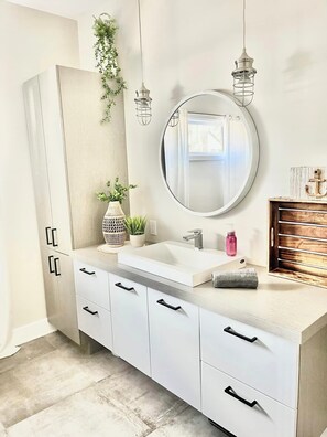 Hair dryer, towels, soap, shampoo