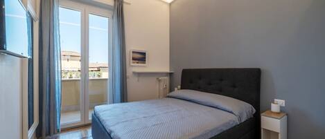 1 غرفة نوم ومكواة/لوح كي وواي فاي وملاءات أسرّة