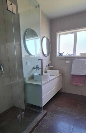 Shower, hair dryer, towels, soap