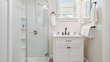 Shower, hair dryer, towels