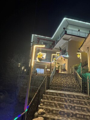 Front of property – evening/night - Goroomgo Paradise Inn Dharmsala (Dharamshala)