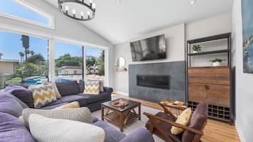 TV, fireplace, books, stereo