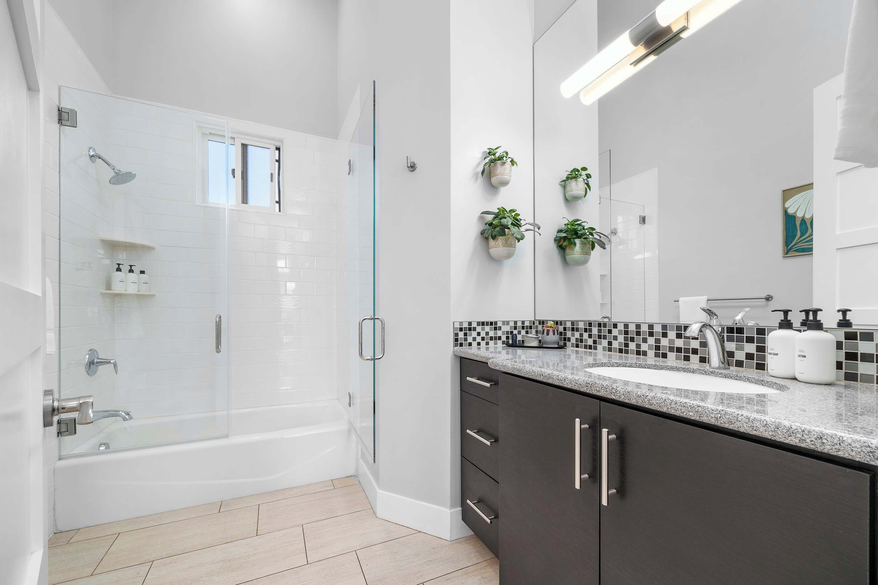 Shower, hair dryer, towels, shampoo