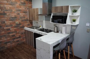 Full-sized fridge, high chair