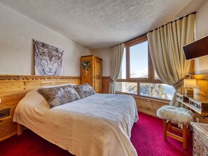 3 bedrooms, travel crib, WiFi, bed sheets - Cosy apartment for 8 people with WIFI, TV and balcony (Les Ménuires)