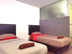 Chambre Standard avec lits jumeaux, 2 lits une place, non-fumeurs | Wi-Fi gratuit, draps fournis