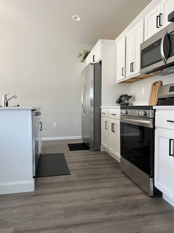 Private kitchen. Charming 3-bedroom house with WiFi and AC in lovely Fargo