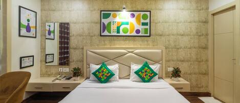 Desk, blackout drapes, iron/ironing board, rollaway beds