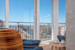 Superior Apartment, 2 Bedrooms, Bay View | Living area | 50-inch LCD TV with cable channels