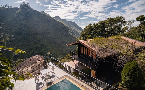 A mountain-view property with a pool, outdoor seating, and a wooden deck. - Ella Deck Resort (Ella)