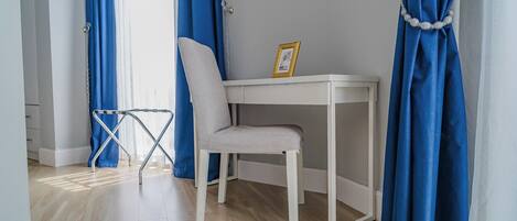 32-inch flat-screen TV with satellite channels