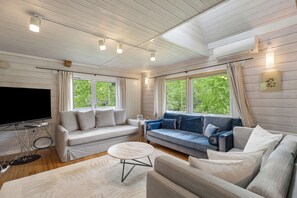 Chalet familiare, vista giardino | Area soggiorno