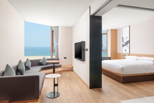 Suite, 1 King Bed, Ocean View | Living room | 55-inch LCD TV with digital channels
