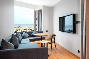 Suite, 1 King Bed, Ocean View | Living area | 55-inch LCD TV with digital channels