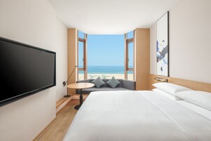 Suite, 1 King Bed, Ocean View | In-room safe, blackout drapes, iron/ironing board, bed sheets