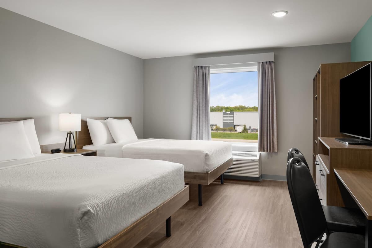 Desk, laptop workspace, free WiFi, bed sheets