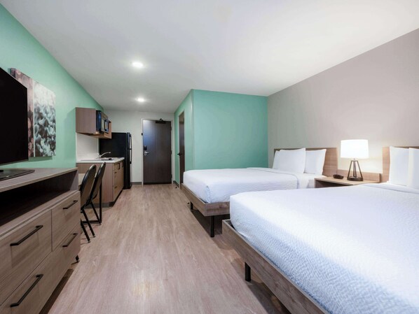 Desk, laptop workspace, free WiFi, bed sheets - ECHO Suites Extended Stay by Wyndham Indianapolis AmeriPlex (Indianapolis)