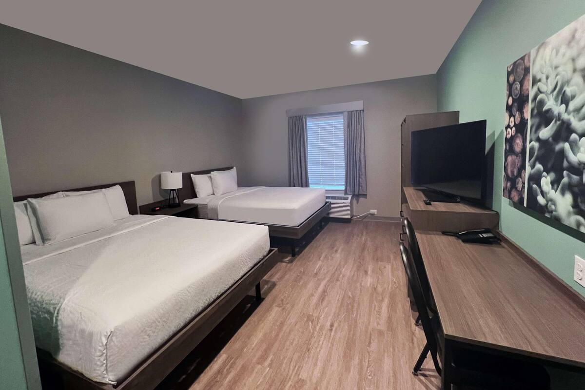 Desk, laptop workspace, free WiFi, bed sheets