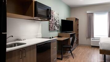Suite, 1 Queen Bed, Non Smoking | Desk, laptop workspace, free WiFi, bed sheets