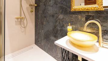 Superior Studio | Bathroom | Shower, hair dryer, slippers, towels