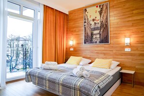 Suite – deluxe, byutsikt | 1 soverom, strykejern/-brett og wi-fi (inkludert)