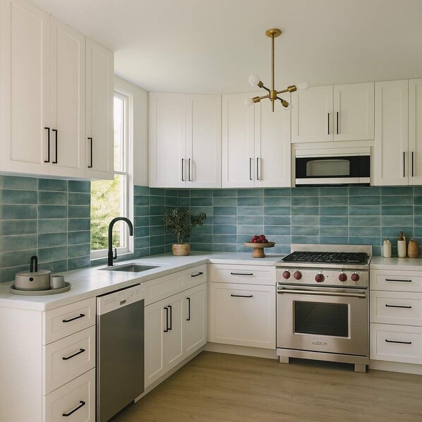 Fridge, stovetop, dishwasher, coffee/tea maker