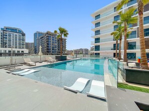 Pool - Luxurious 1 Bedroom Retreat with pool gym and game (Dubai)