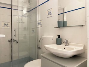 Hair dryer, towels, soap, toilet paper