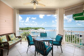 Outdoor dining - Ocean Oasis at Sunset Marina-2 bed 2 bath oceanfront condo w/boat slip rental (Key West)
