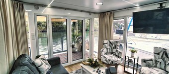 Shangri La: Waterfront Boat Bungalow with Resort Access!