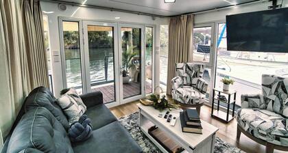 Shangri La: Waterfront Boat Bungalow with Resort Access!