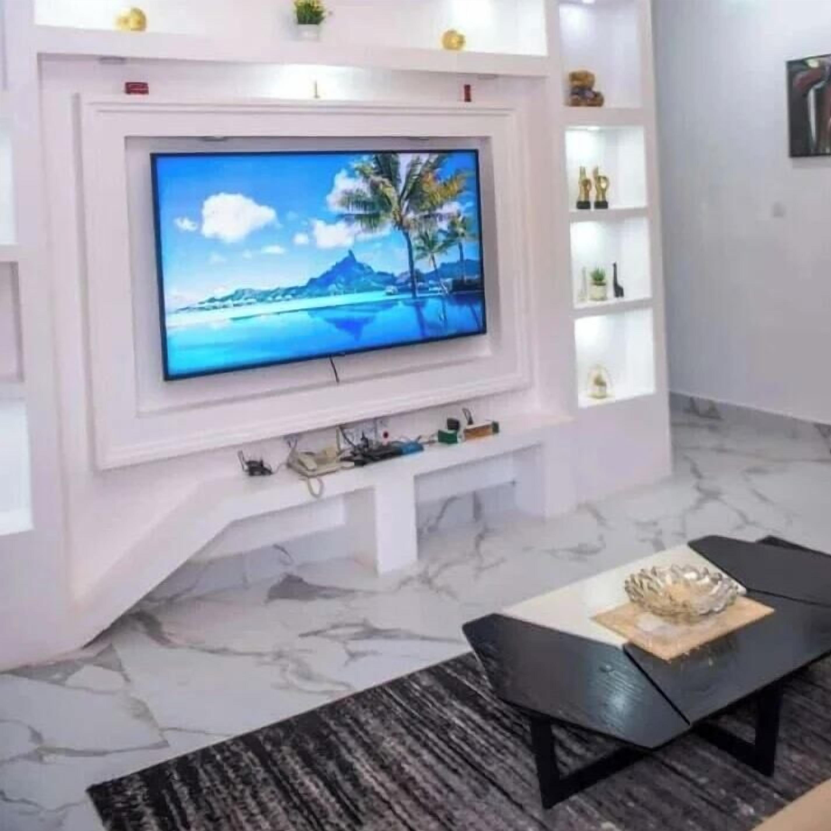 Comfort Room, Balcony, City View | Living area | TV