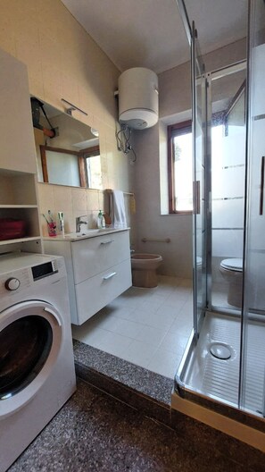 Hair dryer, towels, soap, toilet paper