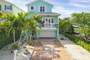 House, 4 Bedrooms | Exterior - Aqua Vista 4 Bedroom Home by RedAwning (Holmes Beach)