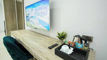 Deluxe Room, Balcony, City View | Desk, laptop workspace, free WiFi