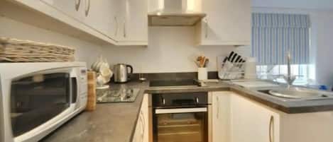 Apartment | Private kitchen | Fridge, microwave, oven, stovetop