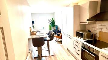 Apartment | Private kitchen | Fridge, microwave, oven, stovetop