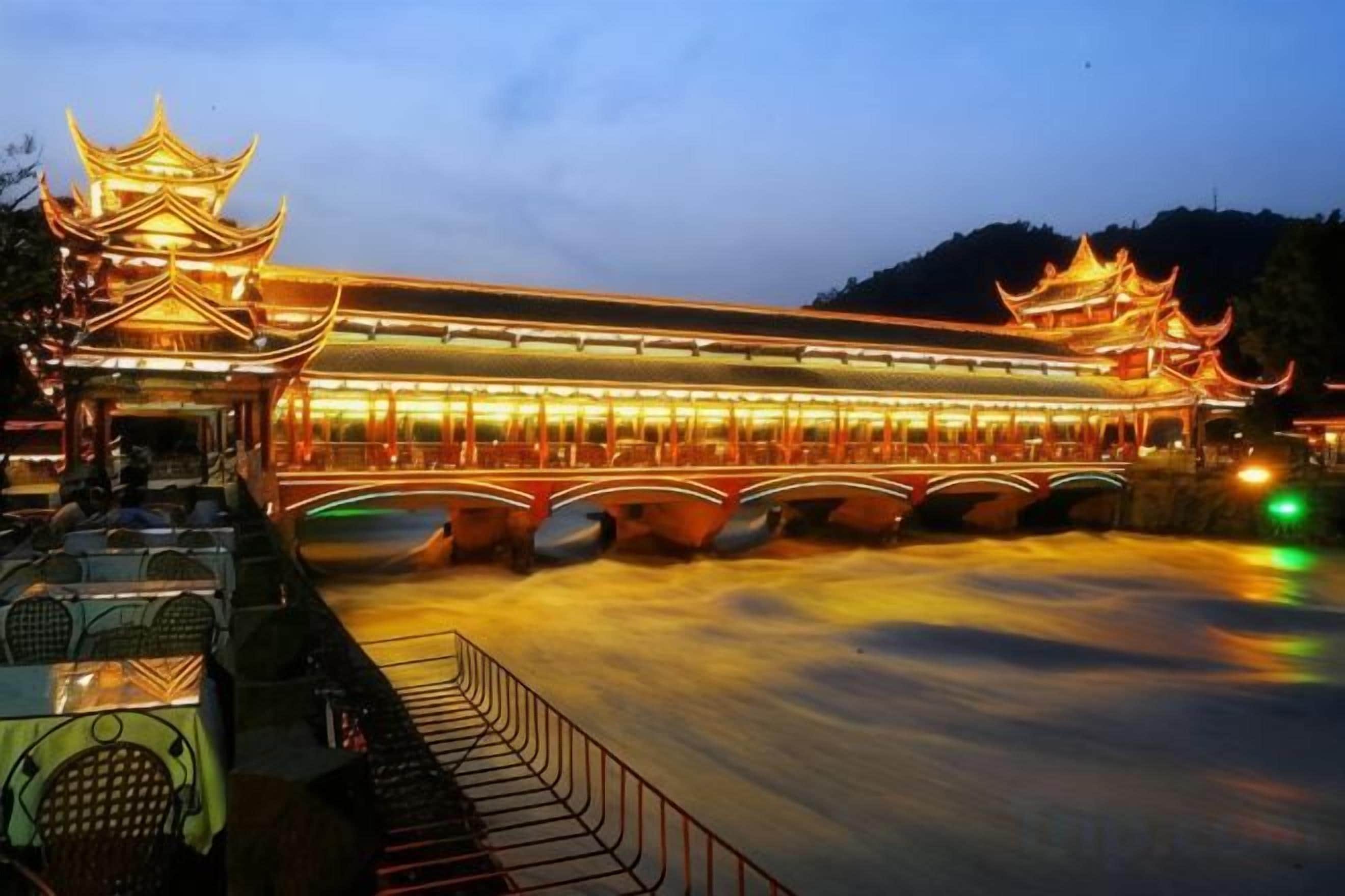 A traditional building with a bridge, likely a historical site.