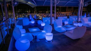 A rooftop bar with modern seating and ambient lighting. - Echelon Heights Hotel (Port Harcourt)