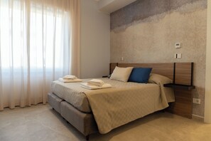 2 bedrooms, in-room safe, desk, iron/ironing board - 20 minutes from Piazza Venezia, new apartment in a commercial area (Roma)