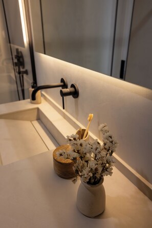 Shower, hair dryer, towels, toilet paper