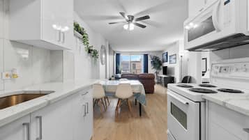Coffee/tea maker, fridge, microwave, oven