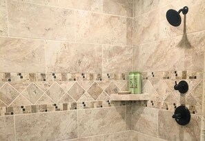 Shower, hair dryer, towels, shampoo
