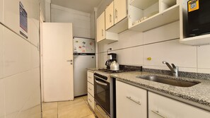 Fridge, microwave, oven, cookware/dishes/utensils