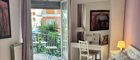 1 bedroom, desk, iron/ironing board, travel cot
