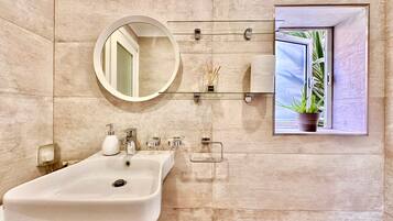 Hair dryer, towels, soap, toilet paper