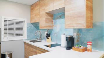 Fridge, microwave, stovetop, coffee/tea maker