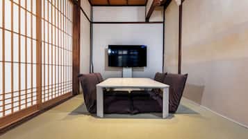 City Townhome | Living area | 50-inch flat-screen TV with cable channels