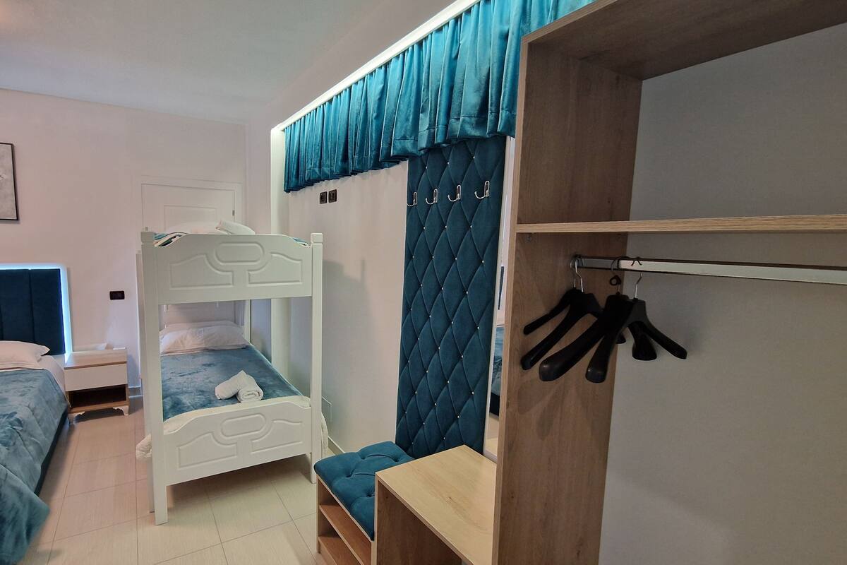 Desk, soundproofing, iron/ironing board (on request), bed sheets