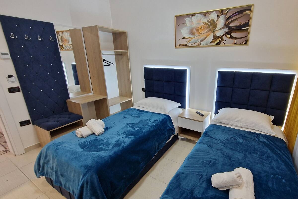 Desk, soundproofing, iron/ironing board (on request), bed sheets